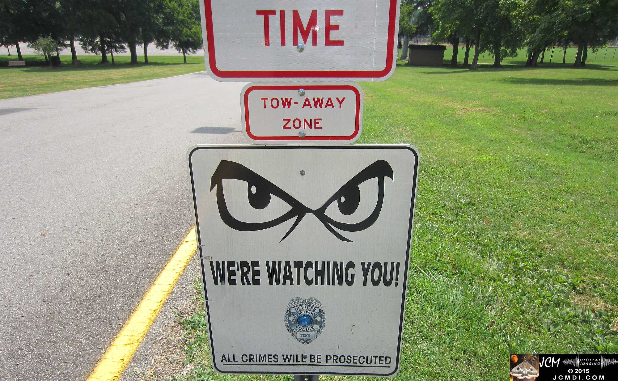 Intimidating Brentwood Tennessee park sign we're watching you